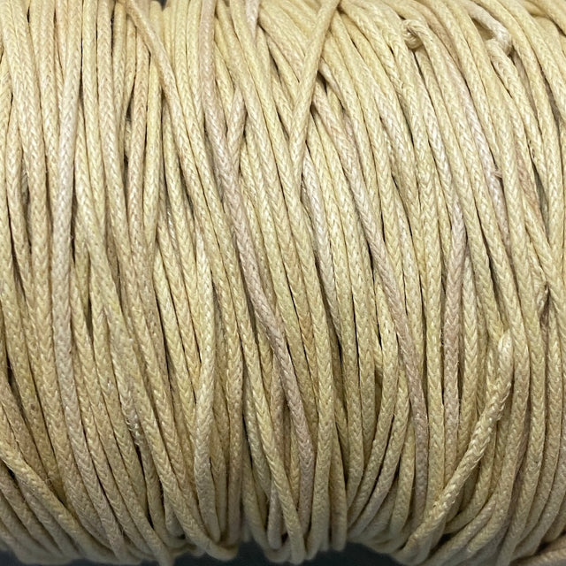 Close-up of beige braided cord