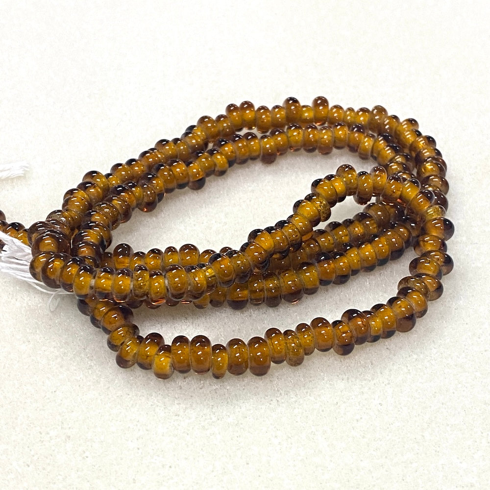 3x6mm Donuts - Transparent Dark Amber - Java Glass Lampwork Beads - (1 strand)