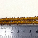 3x6mm Donuts - Transparent Dark Amber - Java Glass Lampwork Beads - (1 strand)