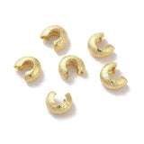 close up of 6 crimp covers with textured gold surface