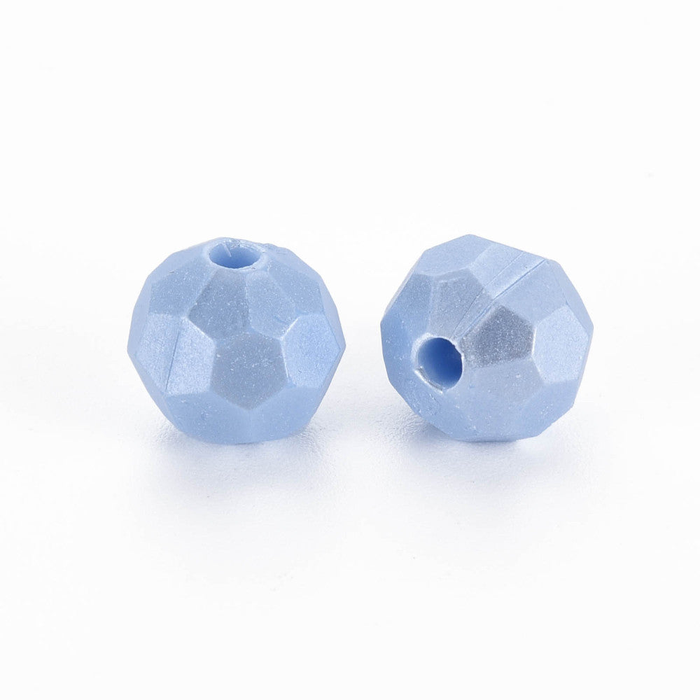 Two faceted light blue beads with central holes, displayed on a clean white background.