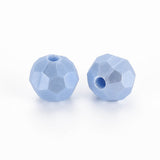 Two faceted light blue beads with central holes, displayed on a clean white background.