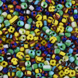Colorful assortment of glass seed beads with various shapes and sizes.