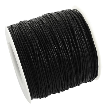 Spool of black cord on a white background