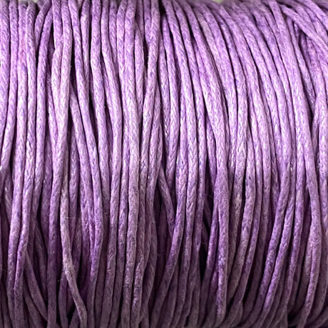 Close-up of light purple wax cotton strands
