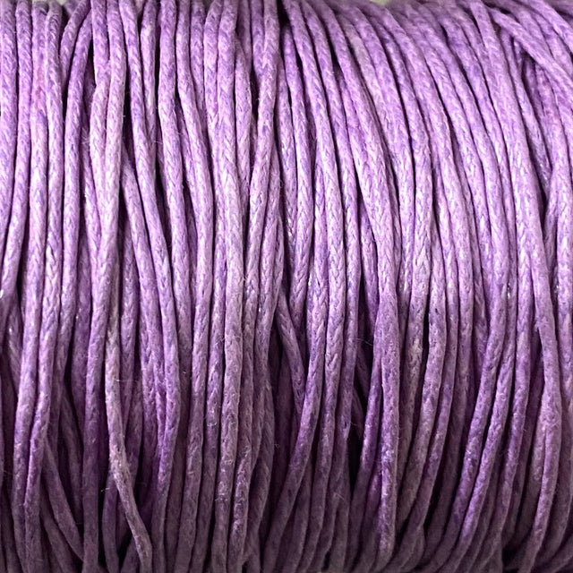 Close-up of light purple wax cotton strands
