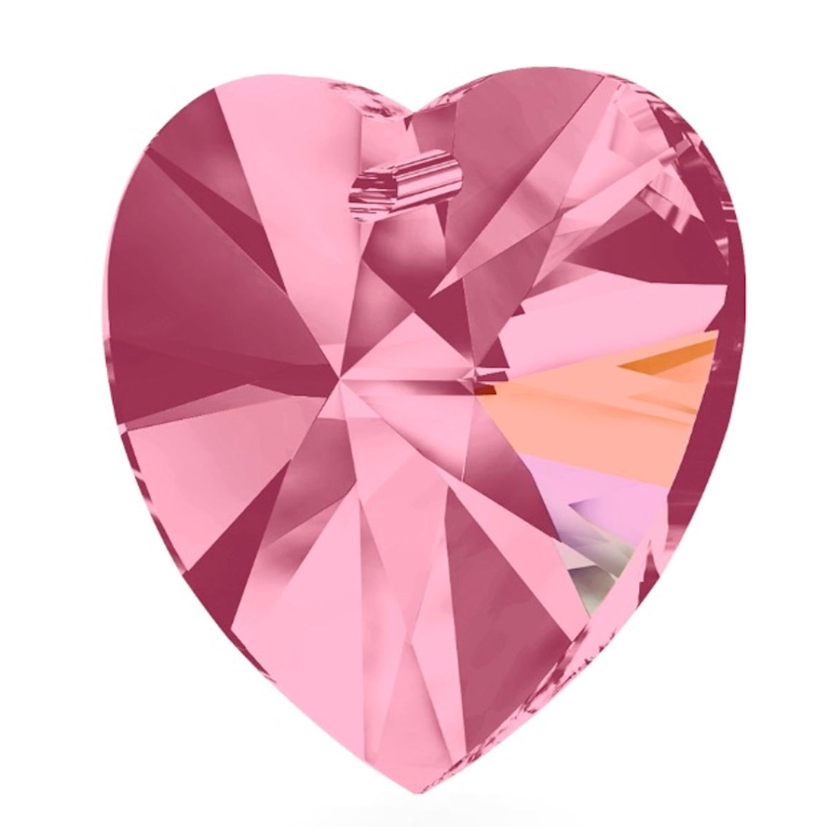 Pink heart-shaped crystal on a white background