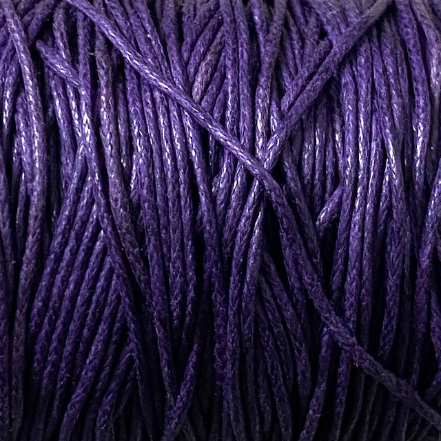 Close-up of purple wax cotton strands