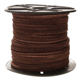 Spool of brown cord on a white background