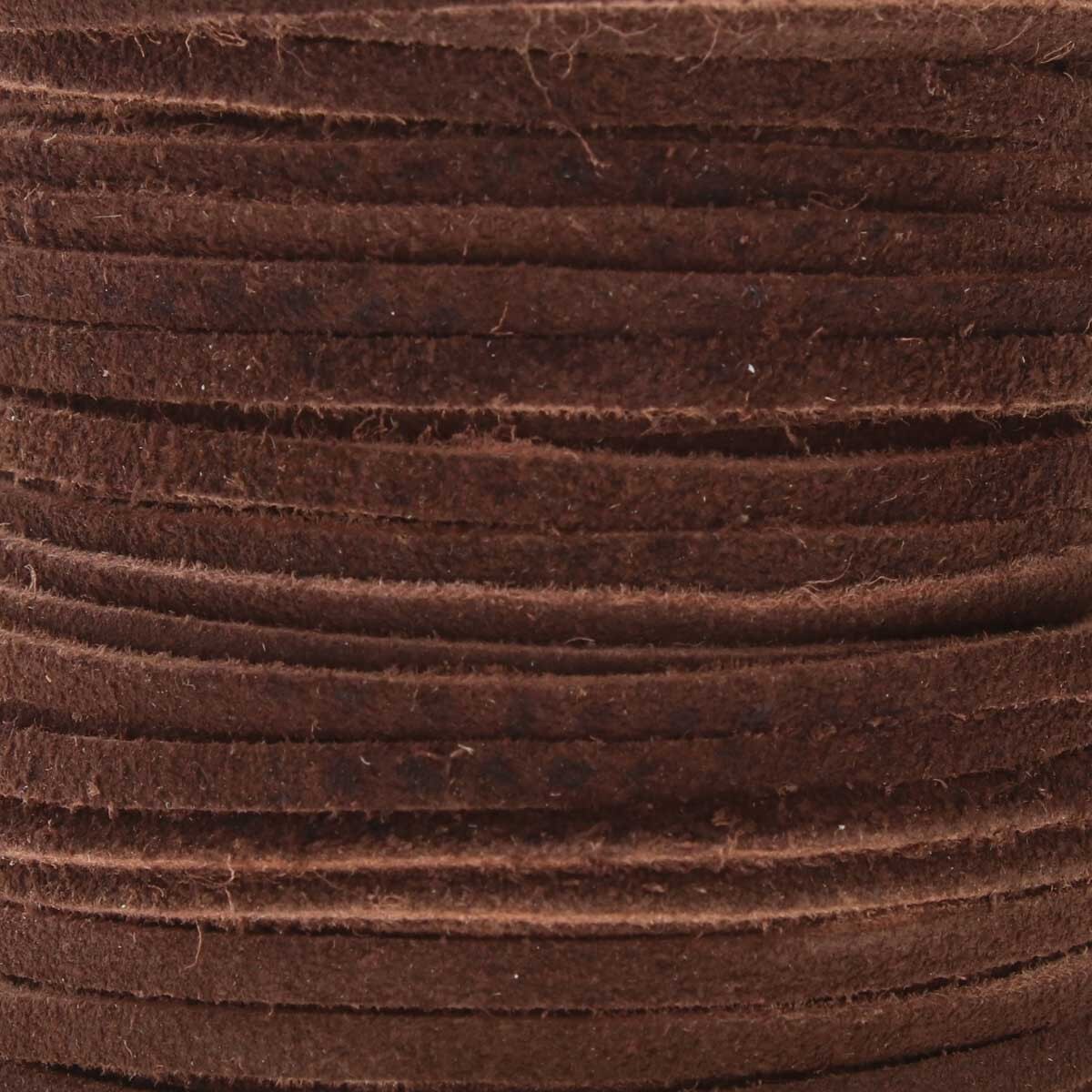 Close-up of brown textured suede lace cord with textured surface