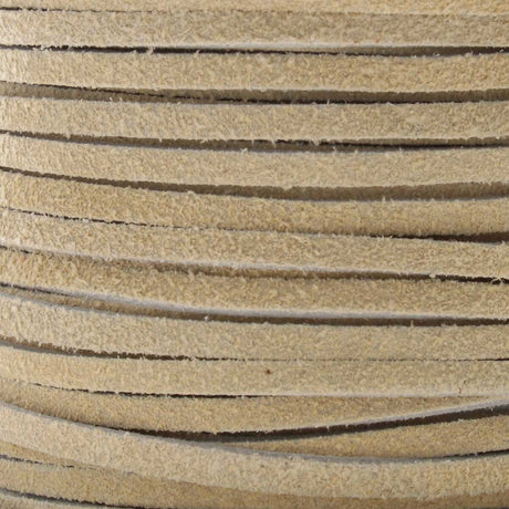 Close-up of beige leather cord with visible texture