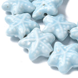 Starfish Star-shaped light blue beads on a white background