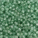 Close-up of green crackle look beads