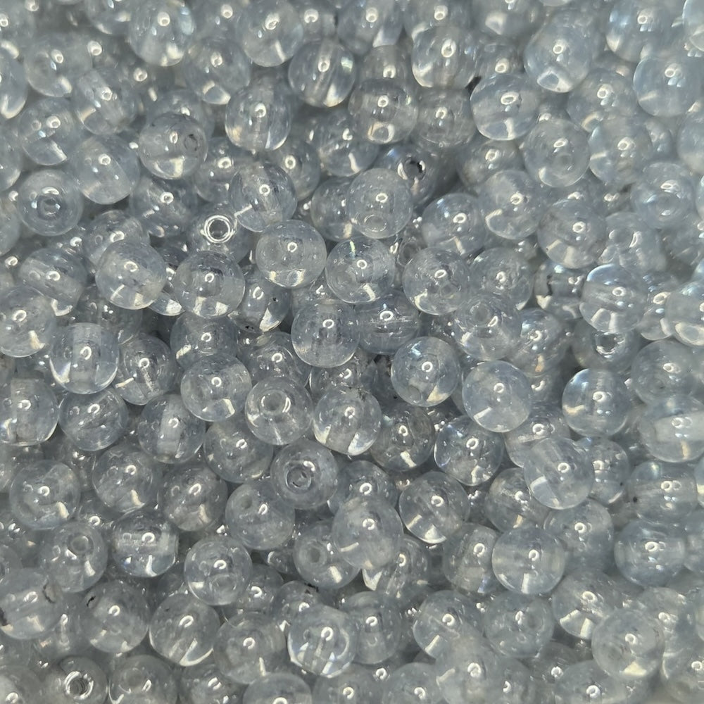 Close-up of very light blue glass beads