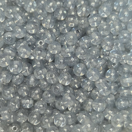 Close-up of very light blue glass beads
