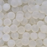 matte opalite glass round beads in a group