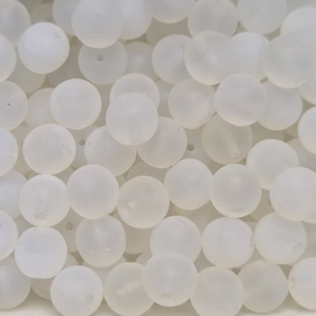 matte opalite glass round beads in a group