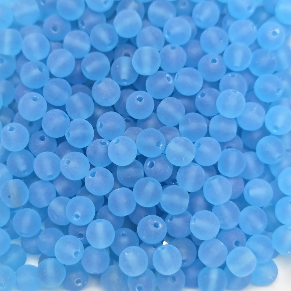 Close-up of blue beads with a soft focus