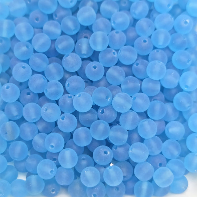 Close-up of blue beads with a soft focus