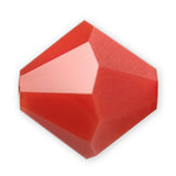 Red hexagonal crystal bead on a white background