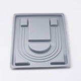 reverse side of a necklace design tool on a white background