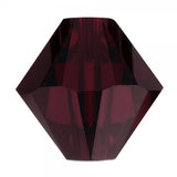 Faceted red crystal on a white background
