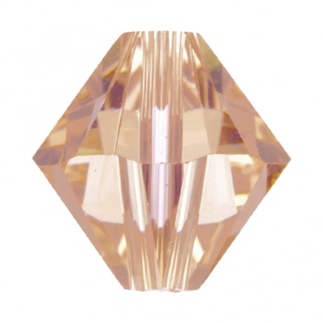 One pale peach faceted crystal beads on a white background