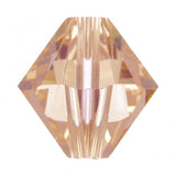 One pale peach faceted crystal beads on a white background