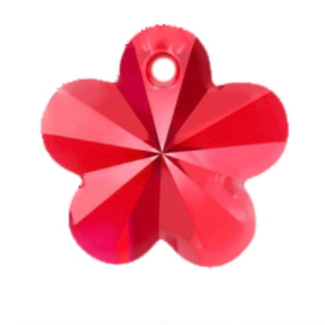 Red flower-shaped crystal bead on a white background