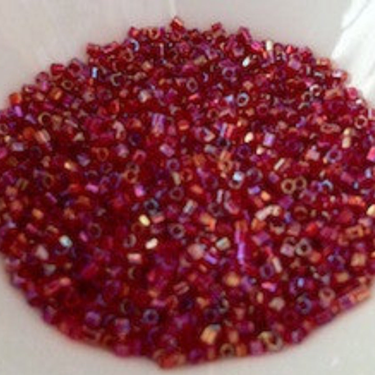 15/0 (#558r 2-cut) Ruby Rainbow - 10g Tube