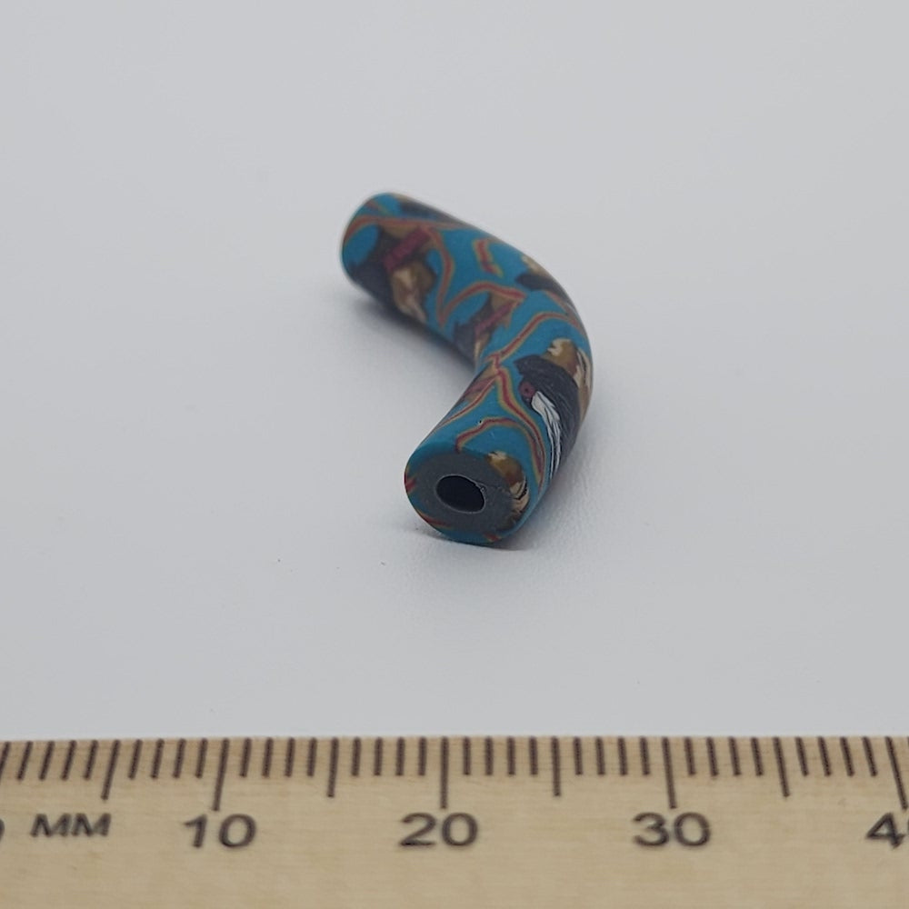 35x7mm Elbow Fimo Beads (10) - Indian Face w. Feathers